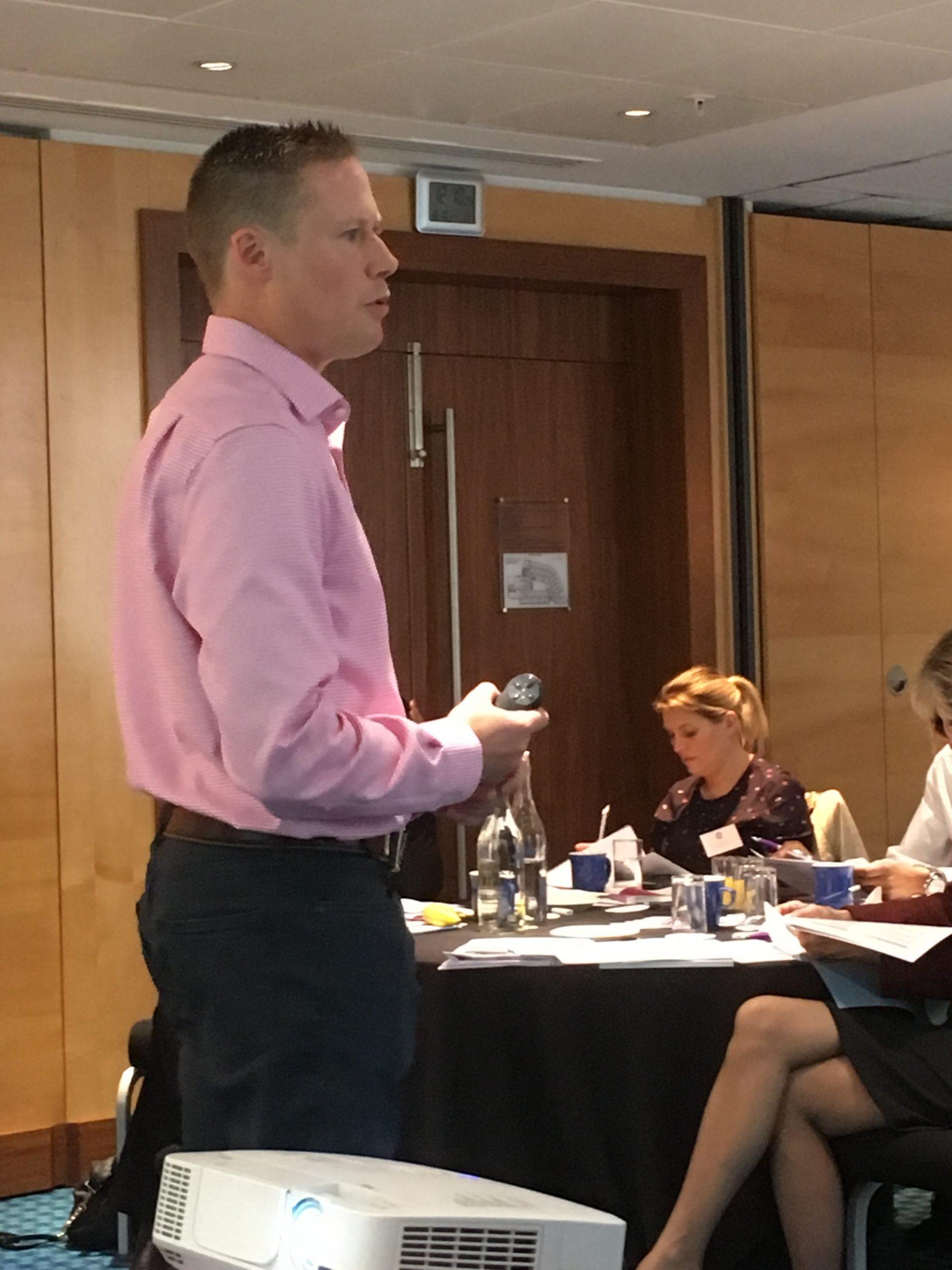 Justin Smith delivering fundraising training to school business professionals